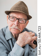 pensive old man with glasses cane. Стоковое фото, агентство Ingram Publishing / Фотобанк Лори