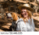 portrait beautiful woman her dog looking away. Стоковое фото, агентство Ingram Publishing / Фотобанк Лори