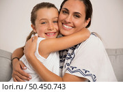 Happy moments between Mother and Daughter at home9. Стоковое фото, агентство Ingram Publishing / Фотобанк Лори