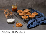 Caramel cookies flowing out of the oven, in the kitchen after baking. Стоковое фото, агентство Ingram Publishing / Фотобанк Лори