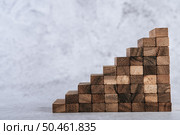 Wooden blocks, used for domino games, Arranged in steps. Стоковое фото, агентство Ingram Publishing / Фотобанк Лори