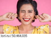 Fashion woman hand cover her ears. Стоковое фото, агентство Ingram Publishing / Фотобанк Лори