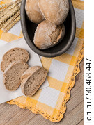 Bread rye spikelets on an old wooden background. Стоковое фото, агентство Ingram Publishing / Фотобанк Лори