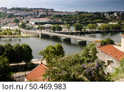 City panorama of Coimbra, Portugal and the river Mondego. Стоковое фото, агентство Ingram Publishing / Фотобанк Лори