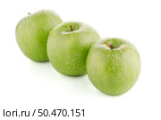 Three fresh green apples on white background. Стоковое фото, агентство Ingram Publishing / Фотобанк Лори