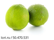 Fresh green limes isolated on white background. Стоковое фото, агентство Ingram Publishing / Фотобанк Лори