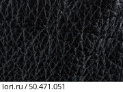 Black leather texture closeup detailed background. Стоковое фото, агентство Ingram Publishing / Фотобанк Лори