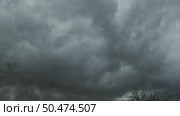 Dark storm clouds and heavy rain. Стоковое видео, видеограф Михаил Коханчиков / Фотобанк Лори