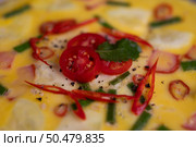 Close up of Steamed eggs containing bacon Chili and spring onion. Стоковое фото, агентство Ingram Publishing / Фотобанк Лори