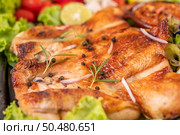 Grilled chicken on the plate with chili Garlic and sprinkled with pepper seeds. Стоковое фото, агентство Ingram Publishing / Фотобанк Лори