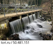 Small water dam in the Nadais leisure park on the banks of the Uima river in Santa Maria da Feira, Portugal. Стоковое фото, агентство Ingram Publishing / Фотобанк Лори