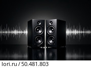 Modern black speakers with sound wave background. Стоковое AI-изображение, AI-художник Андрей Бакусов / Фотобанк Лори