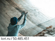 Beggars sitting under the bridge with both hands out in front. Стоковое фото, агентство Ingram Publishing / Фотобанк Лори