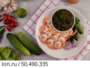 The cooked prawns are arranged in a plate with dipping sauce. Стоковое фото, агентство Ingram Publishing / Фотобанк Лори