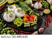 Rice noodle with long beans, tomatoes, bitter melon, chilies, garlic and lime. Стоковое фото, агентство Ingram Publishing / Фотобанк Лори
