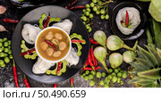 Rice noodles and coconut milk mixed with chilies, bitter melon, lentils, lemons, garlic and eggplant. Стоковое фото, агентство Ingram Publishing / Фотобанк Лори