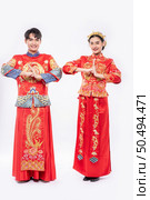 Men and women wear qipao to pay their respects. Isolated on white background. Стоковое фото, агентство Ingram Publishing / Фотобанк Лори