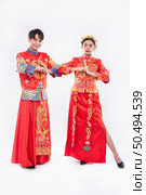 Men and women wear qipao to pay their respects. Isolated on white background. Стоковое фото, агентство Ingram Publishing / Фотобанк Лори