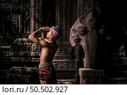 Portrait Handsome shirtless man in turban on head and beautiful silver ornament, The actor in Perform on legend love popular story, Thai Isan folktale called "Phadaeng and Nang-ai" in acient site. Стоковое фото, агентство Ingram Publishing / Фотобанк Лори