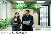 Boss and secretary with the stressful mood of a failed job and angry that the job failed again. Стоковое фото, агентство Ingram Publishing / Фотобанк Лори