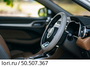 steering wheel in the car, selective focus. Стоковое фото, агентство Ingram Publishing / Фотобанк Лори