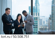 When a group of new businessmen get good news about projects that customers consider accepting proposals. They were overjoyed and delighted with such good news as they sit and rested in the office. Стоковое фото, агентство Ingram Publishing / Фотобанк Лори