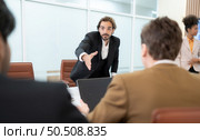 Group of young businessmen in international companies, Meeting to conclude a new responsible project. Стоковое фото, агентство Ingram Publishing / Фотобанк Лори