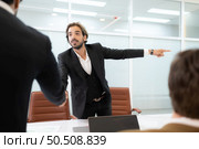Group of young businessmen in international companies, Meeting to conclude a new responsible project. Стоковое фото, агентство Ingram Publishing / Фотобанк Лори