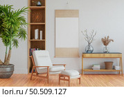 3D illustration, Mockup photo frame on the wall of living room, Interior with houseplant, vases and beautiful furniture, rendering. Стоковое фото, агентство Ingram Publishing / Фотобанк Лори