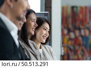 Young asian woman freshman joined the group of young entrepreneurs with three seniors on the team. Welcomed and introduced to senior management. Стоковое фото, агентство Ingram Publishing / Фотобанк Лори