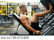 Mixed martial arts fighter going to the gym to build strong muscles To help make the collision more intense and help reduce injuries from punching as well. Стоковое фото, агентство Ingram Publishing / Фотобанк Лори