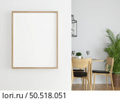 Picture frames with plant pots adorn the living room. Стоковое фото, агентство Ingram Publishing / Фотобанк Лори