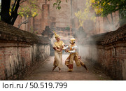 Khon, Is a classic Thai dance in a mask. This is Hanuman expressing his love to Miss. Suphan Matcha. An episode from the Ramayana The greatest Thai literature of Thailand. Стоковое фото, агентство Ingram Publishing / Фотобанк Лори