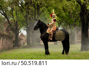 Khon is a classic Thai dance in a mask in Ramayana literature, and this is another character, His nam is Wirun Chambang and a horse named Nilphahu. Стоковое фото, агентство Ingram Publishing / Фотобанк Лори