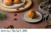 Traditional portuguese Christmas sweets Sonhos with sugar and cinnamon on kitchen countertop. Стоковое фото, агентство Ingram Publishing / Фотобанк Лори