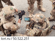 Special operations forces, Study geography and plan an attack on the enemy. Стоковое фото, агентство Ingram Publishing / Фотобанк Лори