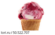 Ice cream cone with scoop of red fruits isolated on white background. Стоковое фото, агентство Ingram Publishing / Фотобанк Лори
