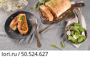 Puff pastry vegetable roll on kitchen decorated countertop. Стоковое фото, агентство Ingram Publishing / Фотобанк Лори