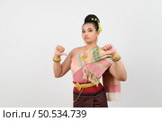 Portrait Young beautiful woman in a costume of the northeastern region with feel bad, she posing thumb down feel upset and grimace on white background, copy space. Стоковое фото, агентство Ingram Publishing / Фотобанк Лори