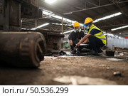 Scientists and government officials Inspect and collect chemical leak samples in industrial sites. to be thoroughly investigated in the laboratory. Стоковое фото, агентство Ingram Publishing / Фотобанк Лори