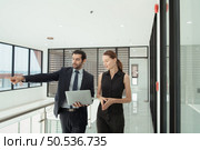 Young executives had fun conversations and exchanges. Once the project has been approved by the top management After completing the presentation at the meeting. Стоковое фото, агентство Ingram Publishing / Фотобанк Лори