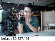 The advancement of technology has helped to alleviate human burdens. hand-controlled robot It is another type of work that assists in reducing the limits of people conducting their own work. Стоковое фото, агентство Ingram Publishing / Фотобанк Лори