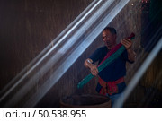 Boiling the flax tree is the first step of dyeing into different colors to weave mats. One of the occupations and way of life of rural villagers in Thailand. Стоковое фото, агентство Ingram Publishing / Фотобанк Лори