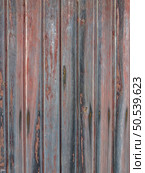 Red painted old wooden wall. Red background. Стоковое фото, агентство Ingram Publishing / Фотобанк Лори