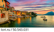 Varenna scenic sunset view in Como lake, Italy. Стоковое фото, агентство Ingram Publishing / Фотобанк Лори