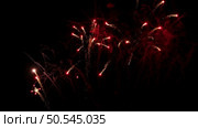 Beautiful fireworks show on a dark night sky. Стоковое фото, агентство Ingram Publishing / Фотобанк Лори