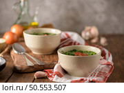 Caldo verde popular soup in Portuguese cuisine. traditional ingredients for caldo verde are potatoes, collard greens , olive oil and salt. Additionally garlic or onion may be added. Стоковое фото, агентство Ingram Publishing / Фотобанк Лори