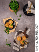 Pastries filled with meat, traditionally baked in black clay molds both from the region on Vila Real, Portugal. Стоковое фото, агентство Ingram Publishing / Фотобанк Лори