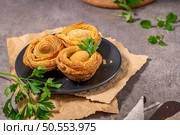 Pastries filled with meat, traditionally baked in black clay molds both from the region on Vila Real, Portugal. Стоковое фото, агентство Ingram Publishing / Фотобанк Лори
