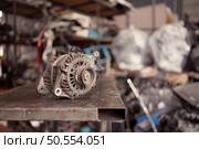 The image of car engine parts that customers bring in for repairs. In the engine repair shop. Стоковое фото, агентство Ingram Publishing / Фотобанк Лори